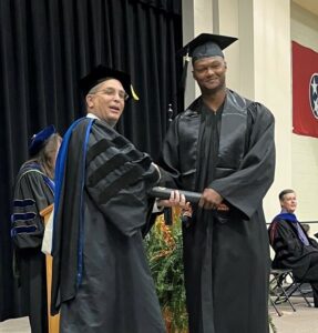 Man Getting his Diploma