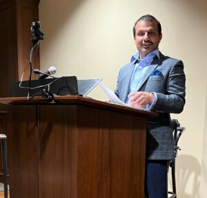 man standing at a podium